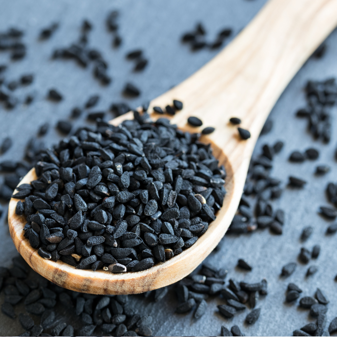 black-cumin-seeds-on-wooden-spoon