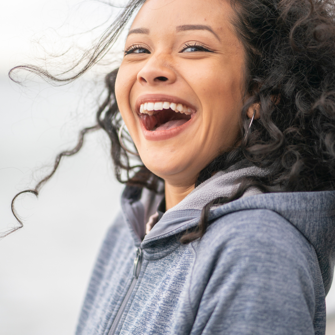 woman-laughing-and-energised