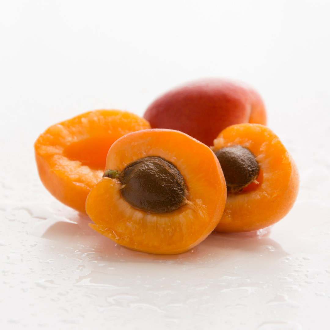 apricot-fruit-sliced-in-half-on-display